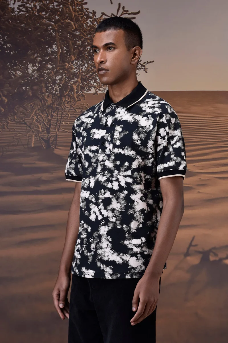 Genes Lecoanet Hemant  Black Abstract Print Polo for Men | Best Price UAE